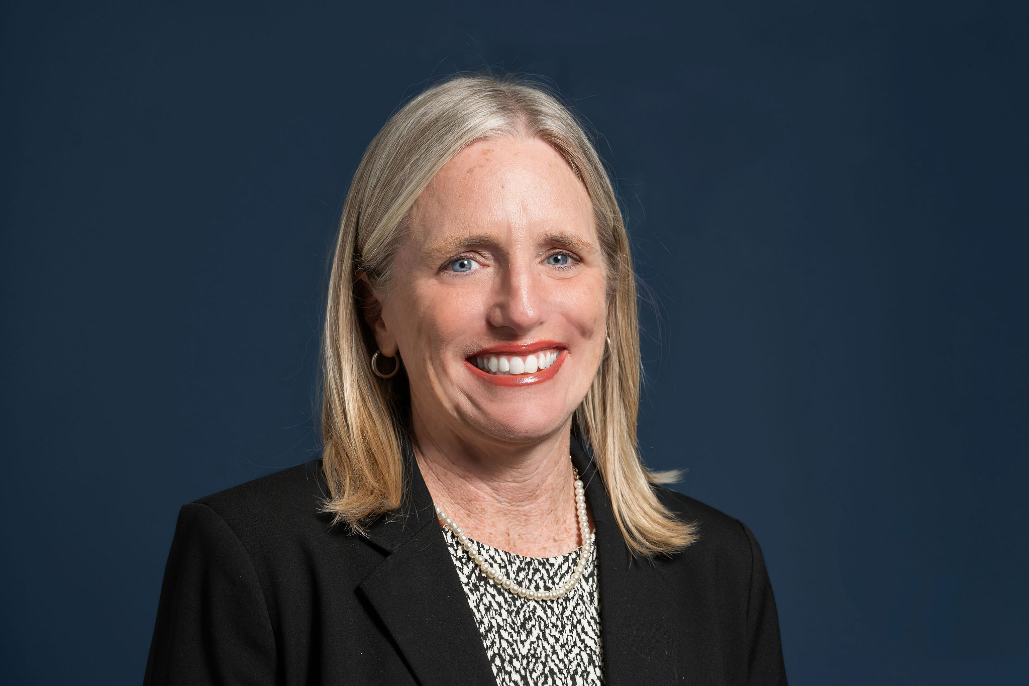 A headshot of Kelly Coyle