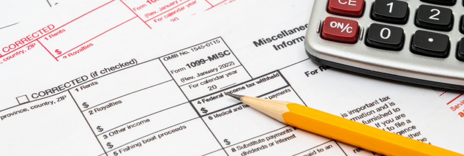 1099 misc form pencil and calculator Stop Scrambling: How to Prepare Your Business for Tax Season