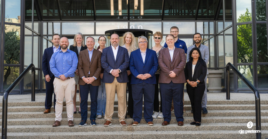 cjg partners team standing on the steps in front of their office building in schaumburg ilinois What Makes CJG Partners a Great Place to Work